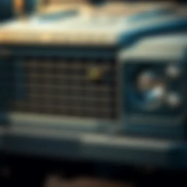 Front Grille and Headlights of the Square Land Rover A close-up view of the square Land Rover's iconic front grille and headlights