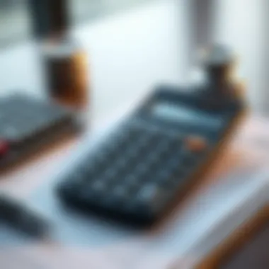 Financial Calculations for Auto Loan Refinancing A calculator and notepad illustrating financial calculations