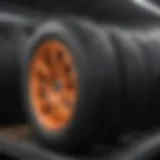 Different types of tires displayed on a shelf